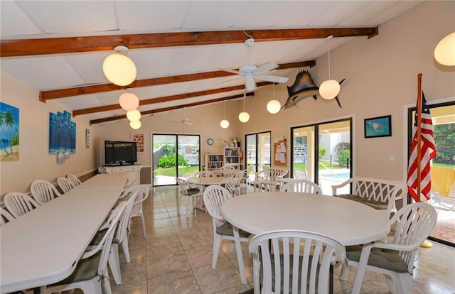 dining area with ceiling fan and vaulted ceiling with beams