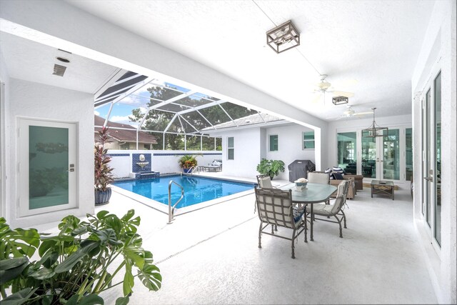 view of swimming pool with a fenced in pool