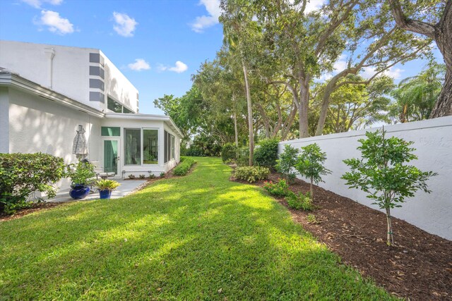 view of yard with fence