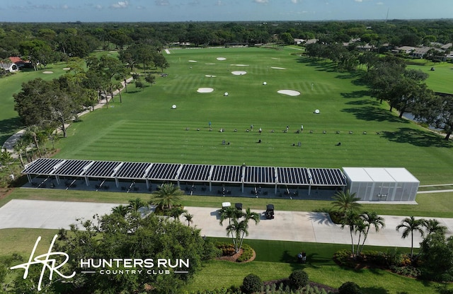 birds eye view of property with golf course view