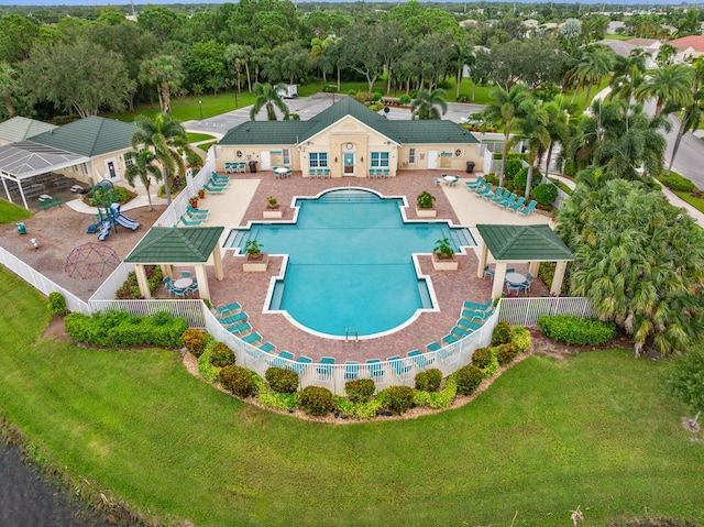 view of swimming pool featuring a gazebo, a lawn, a patio, and fence