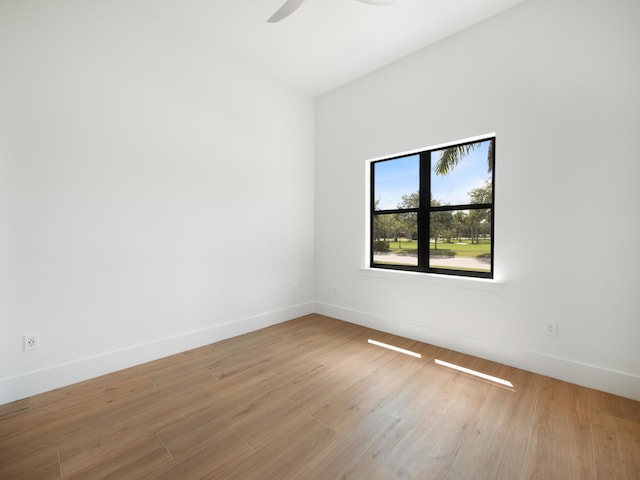 empty room with light hardwood / wood-style floors and ceiling fan