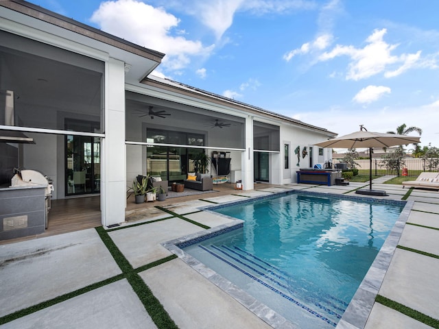 view of pool with a patio, a hot tub, and ceiling fan