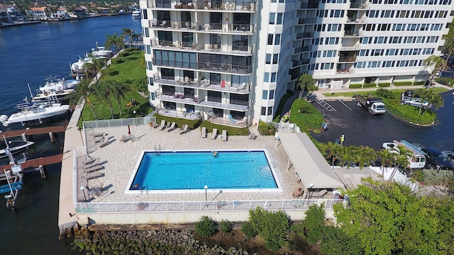 birds eye view of property featuring a water view