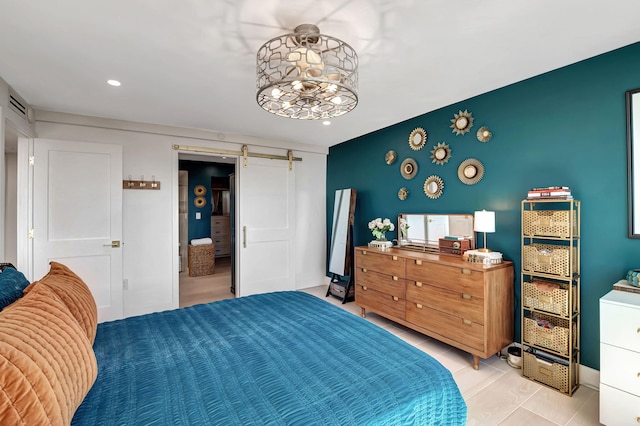 bedroom with a barn door