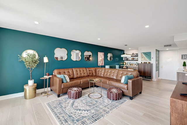 living room with light hardwood / wood-style floors