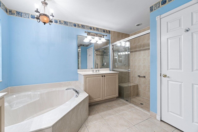 bathroom with vanity, plus walk in shower, and tile patterned floors