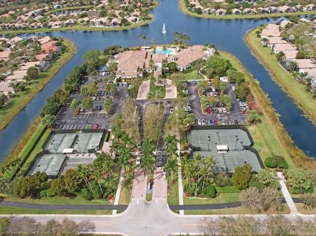 aerial view featuring a residential view and a water view