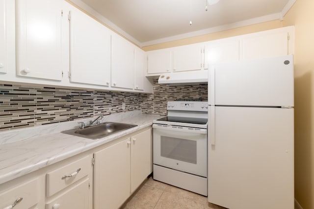 kitchen with white appliances, tasteful backsplash, sink, white cabinetry, and light tile patterned floors