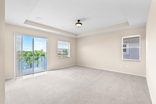 sunroom / solarium with ceiling fan, a water view, and a healthy amount of sunlight