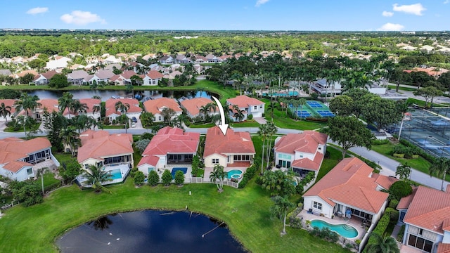 drone / aerial view featuring a water view