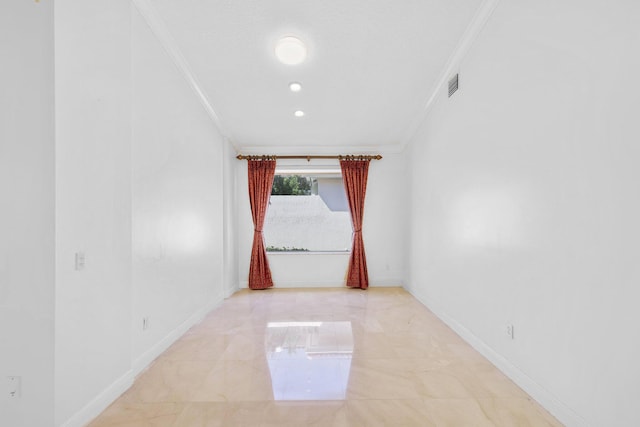 hallway featuring crown molding