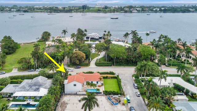 birds eye view of property featuring a water view