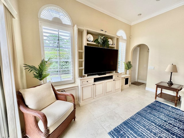 tiled living room featuring ornamental molding