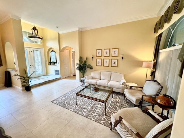 tiled living room featuring ornamental molding