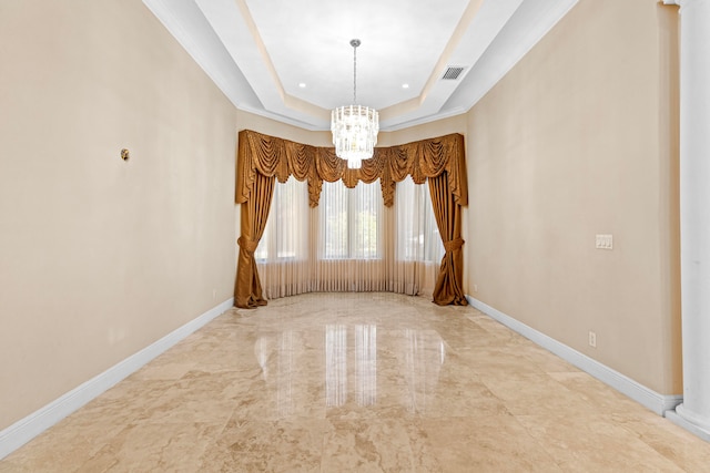 unfurnished room featuring crown molding, a raised ceiling, and an inviting chandelier