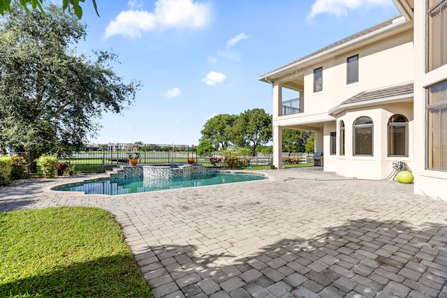 view of pool featuring a patio area