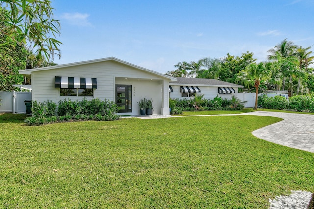 view of front of home with a front lawn