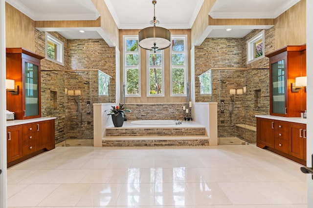 bathroom with tile patterned flooring, ornamental molding, and separate shower and tub