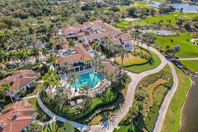 drone / aerial view with a water view