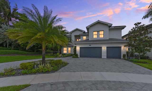 view of front of home with a garage