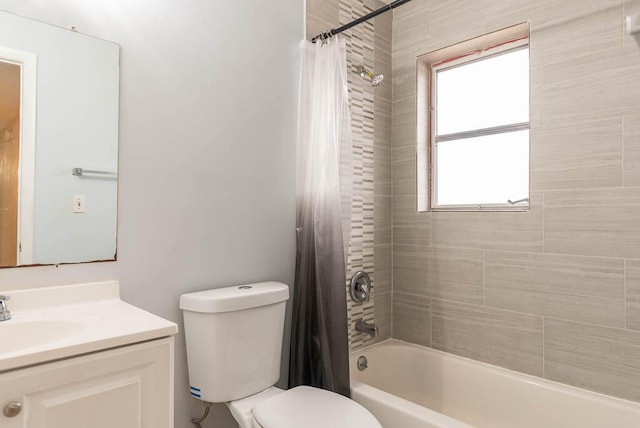 full bathroom featuring vanity, toilet, and shower / bathtub combination with curtain