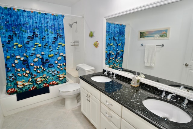 full bathroom with vanity, shower / tub combo with curtain, toilet, and tile patterned flooring