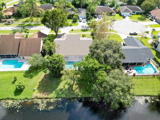 drone / aerial view with a water view