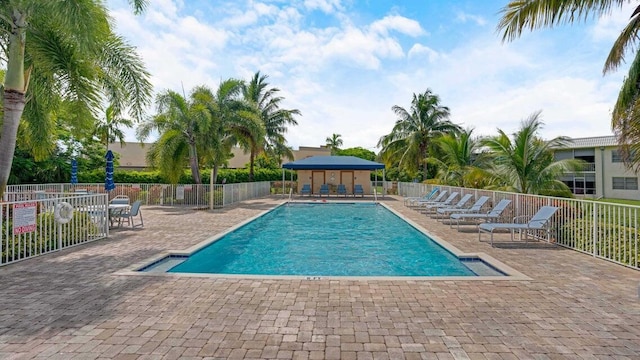 view of swimming pool with a gazebo and a patio area