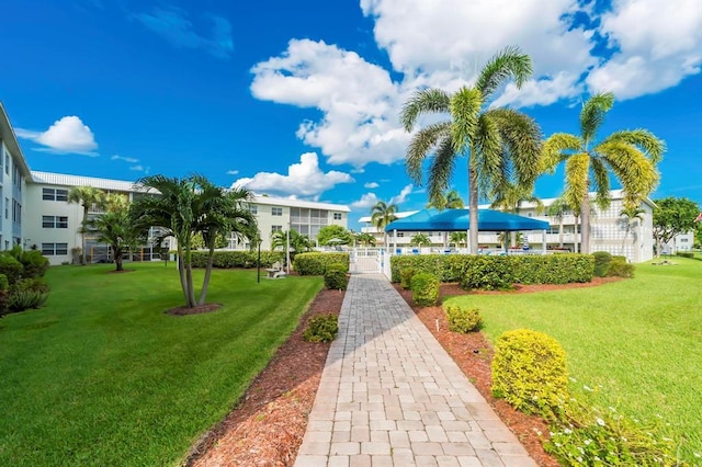 surrounding community featuring a lawn