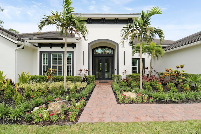 entrance to property featuring french doors