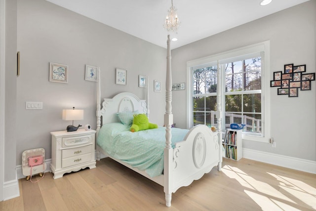 bedroom with light hardwood / wood-style flooring