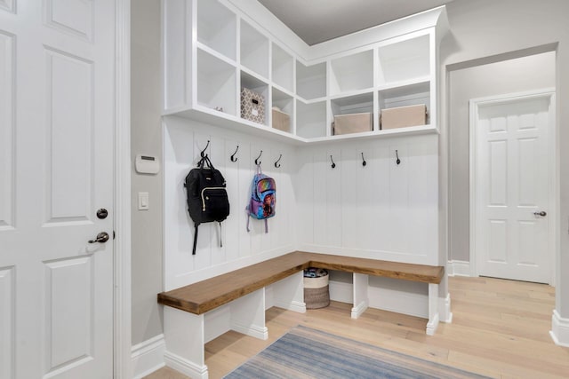 mudroom with hardwood / wood-style flooring