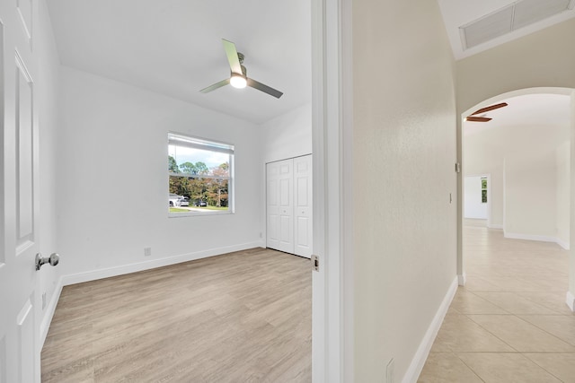 corridor featuring light hardwood / wood-style flooring