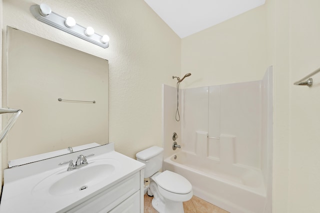 full bathroom with vanity, toilet, tile patterned floors, and  shower combination