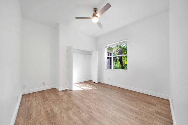 unfurnished bedroom featuring light hardwood / wood-style flooring and ceiling fan