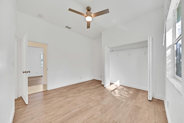 interior space featuring ceiling fan, light hardwood / wood-style floors, and plenty of natural light