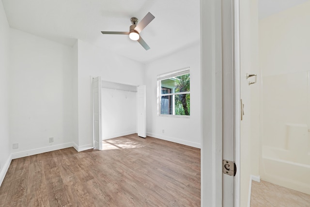 unfurnished bedroom featuring ceiling fan and light hardwood / wood-style flooring