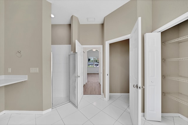 bathroom featuring tile patterned flooring