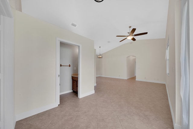 interior space with vaulted ceiling and ceiling fan