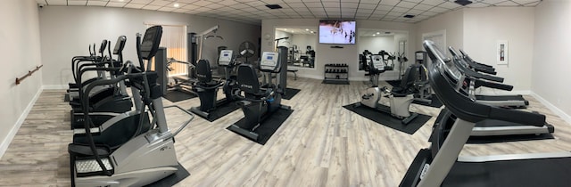 gym with light wood-type flooring