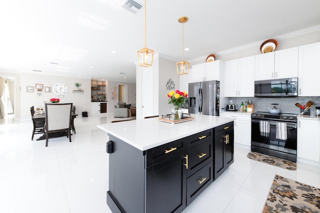 kitchen with a center island, stainless steel appliances, decorative light fixtures, and white cabinets