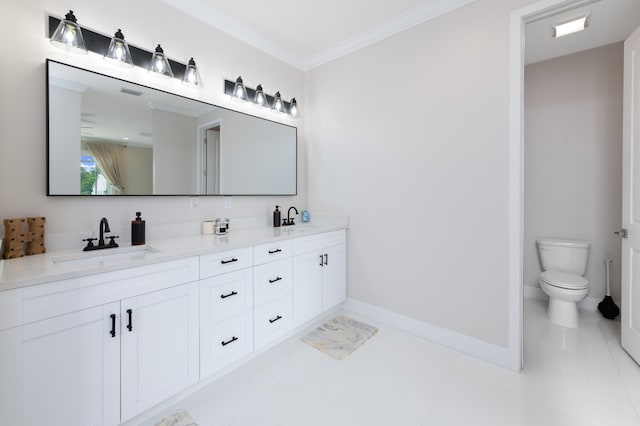 bathroom featuring vanity, toilet, tile patterned floors, and ornamental molding