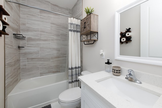 full bathroom with vanity, toilet, and shower / tub combo