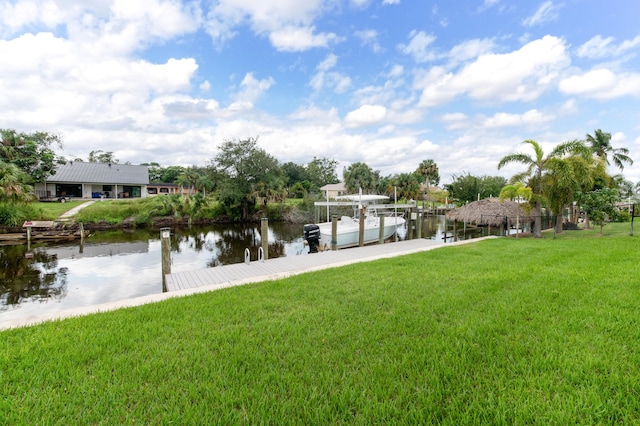 exterior space featuring a yard and a water view