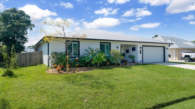 ranch-style house featuring fence, concrete driveway, a front yard, stucco siding, and a garage