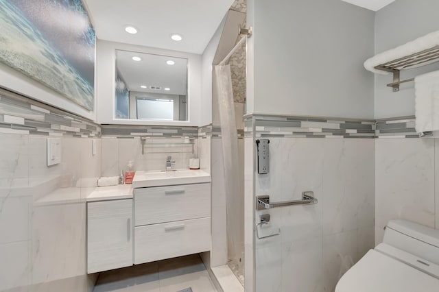 bathroom featuring vanity, a shower with curtain, and toilet