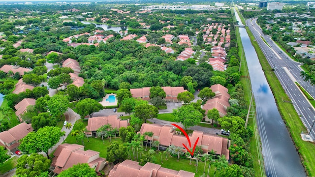 drone / aerial view with a water view