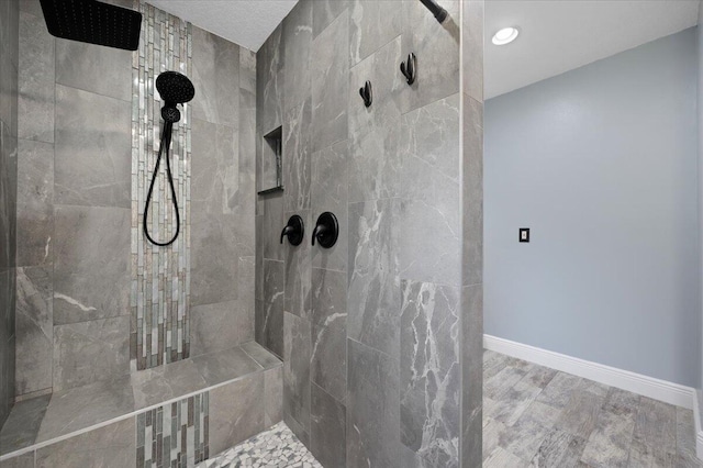 bathroom featuring tiled shower