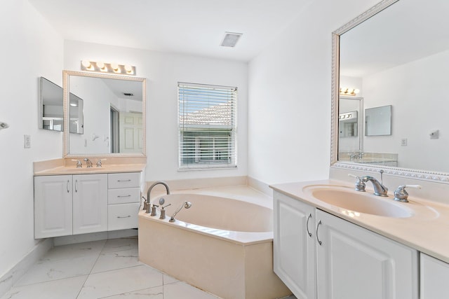 bathroom featuring vanity and a bathtub